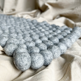 Lässige Liegematte aus reiner Schafwolle